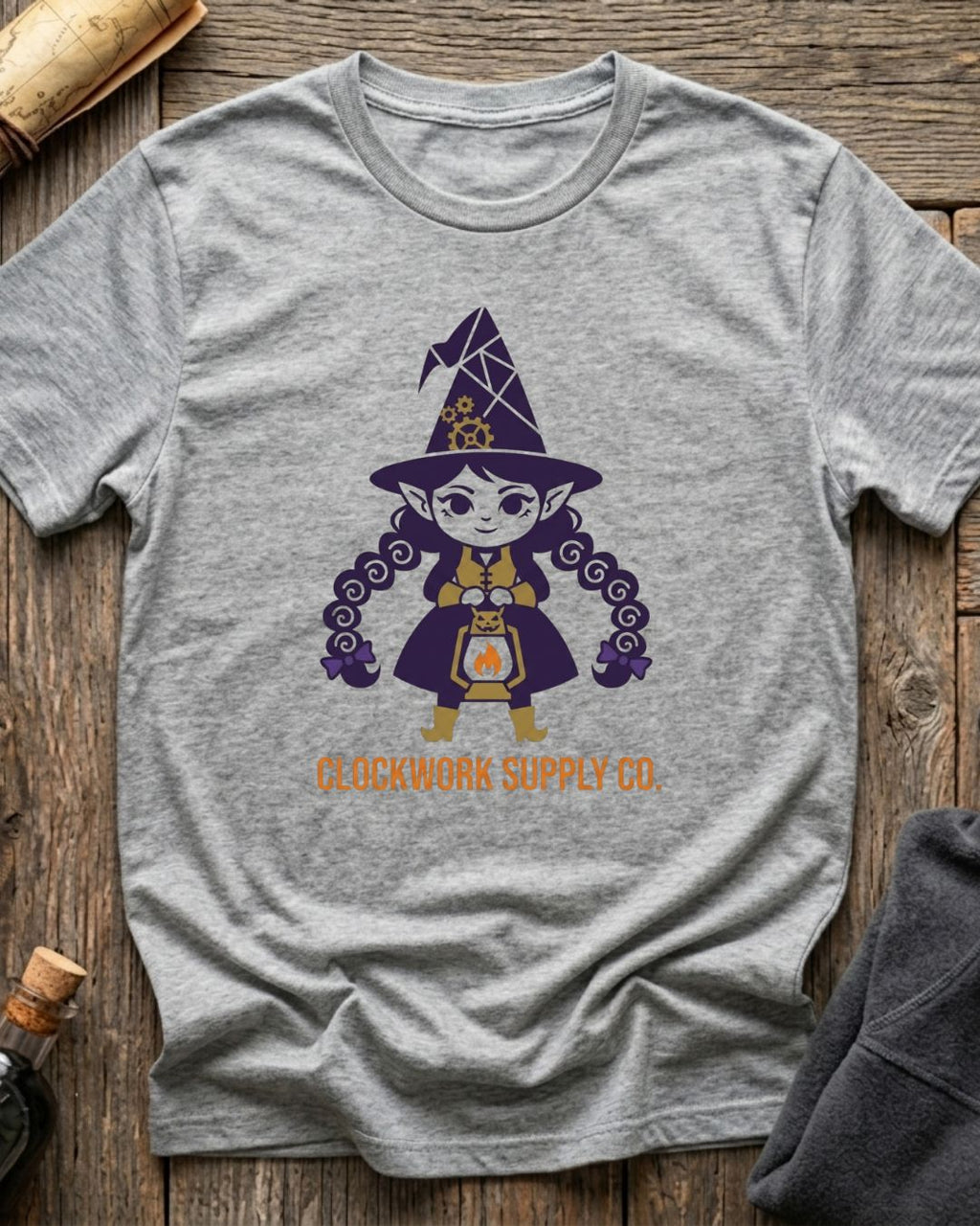 Athletic Heather t-shirt featuring the Clockwork Supply Co. design with Sprocket the gnome