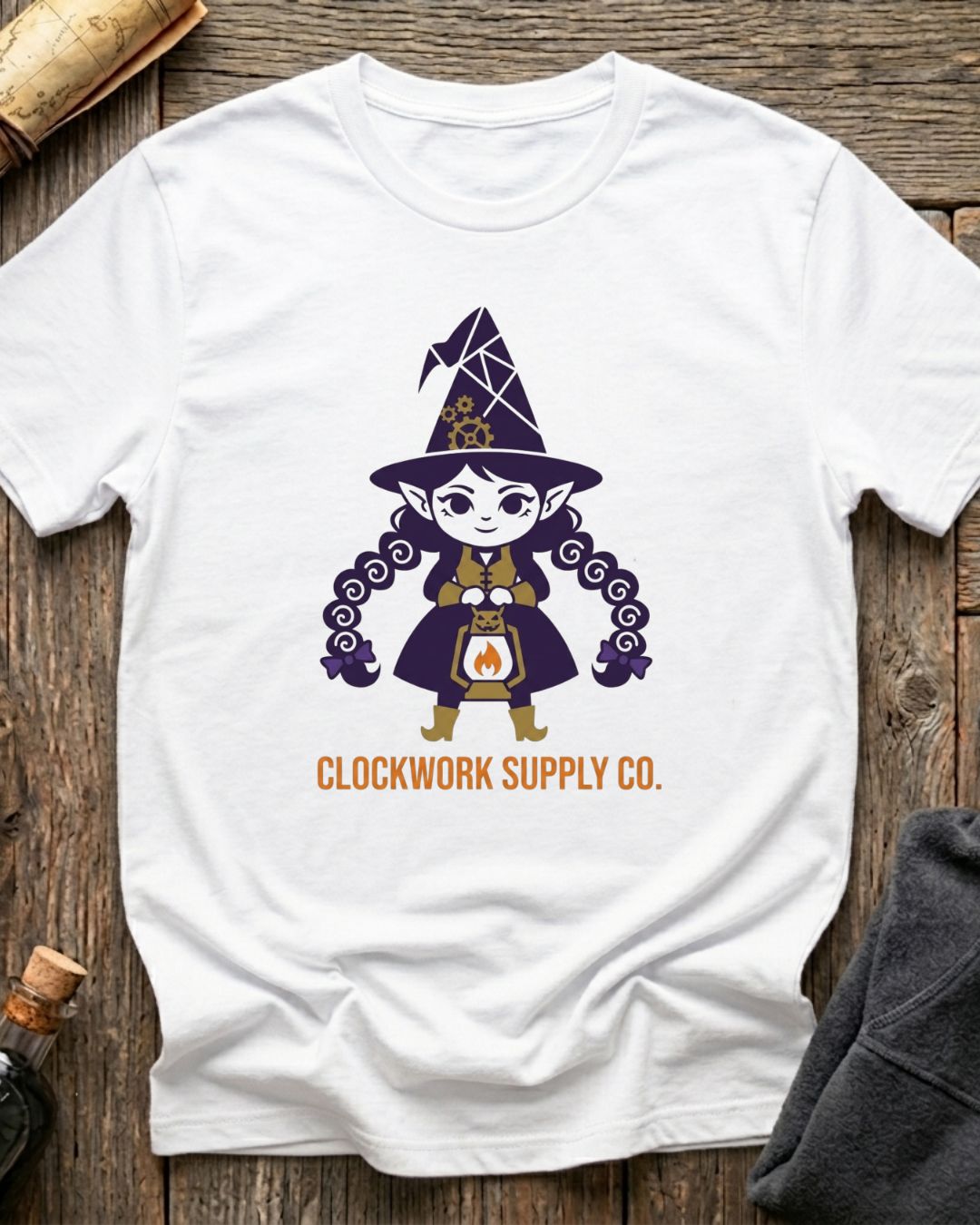 White t-shirt featuring the Clockwork Supply Co. design with Sprocket the gnome
